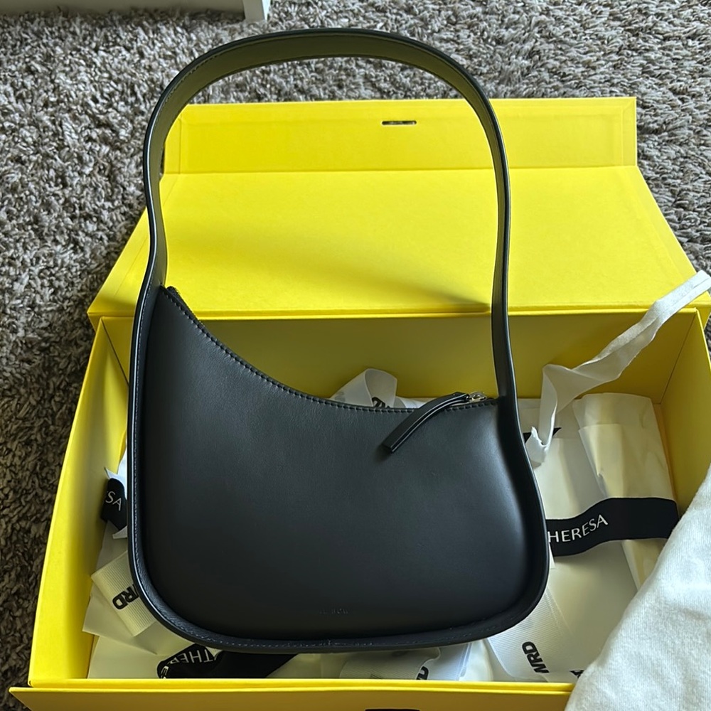 The Row half moon leather bag